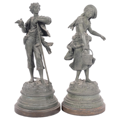 676 - A pair of Vintage spelter country figures - she with a pail and he with a bird, on wooden plinths, H... 