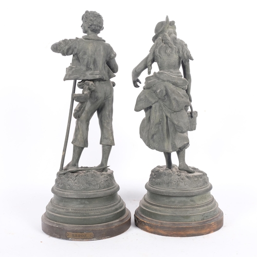 676 - A pair of Vintage spelter country figures - she with a pail and he with a bird, on wooden plinths, H... 