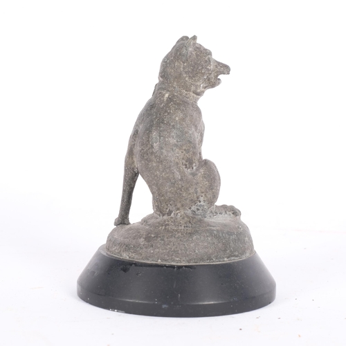 678 - A 19th century lead study of a dog, on stone plinth, H11.5cm