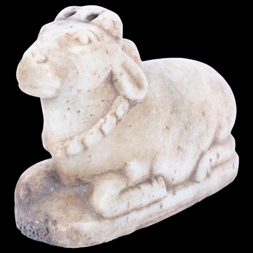 A carved stone study of a Shiva bull, L25cm, H18cm