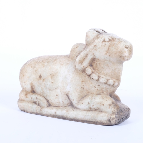 10 - A carved stone study of a Shiva bull, L25cm, H18cm