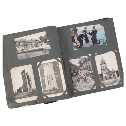 108 - An album containing early 20th and later postcards, military photographs relating to Sapper J Dore, ... 