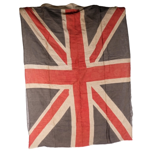 115 - A Royal Navy white ensign, 67cm x 135cm, and a 20th century Union Jack, 82cm x 112cm approx (2)