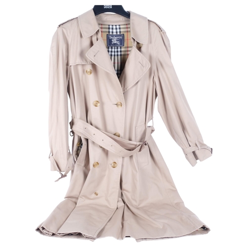 125 - A Burberry beige trench coat, no size present, pit to pit 60cm, L120cm