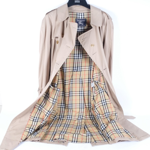 125 - A Burberry beige trench coat, no size present, pit to pit 60cm, L120cm