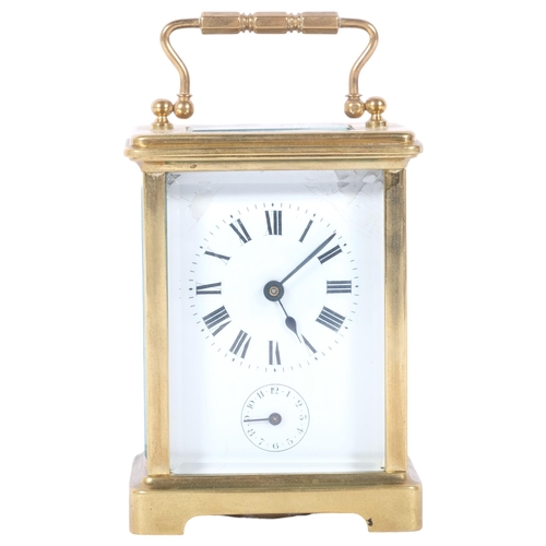 131 - A French brass-cased carriage clock with alarm, height 11cm not including handle, white enamel dial ... 