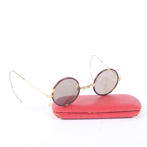 136 - A pair of 10ct gold plated wirework glasses