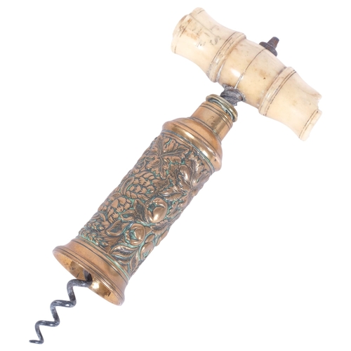 139 - An Antique Thomason corkscrew with bone handle (missing its brush), with floral embossed brass body