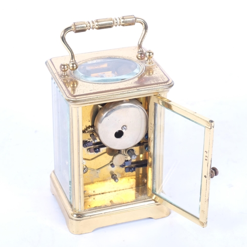 141 - A French brass-cased carriage clock with alarm, height 11cm not including handle (currently not in w... 