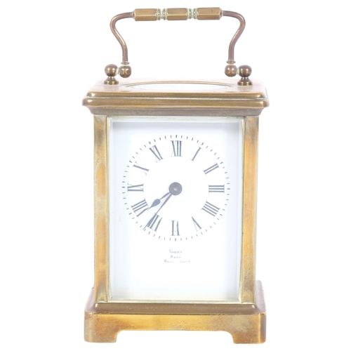 142 - VOKERS, BATH - a brass-cased carriage clock, height 11cm not including handle (currently not in work... 