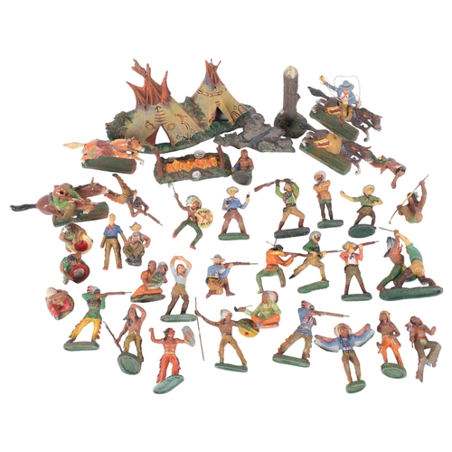 143 - A collection of 20th century Elastolin Cowboy and Indian figures, campfire etc