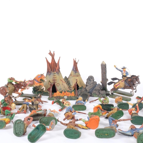 143 - A collection of 20th century Elastolin Cowboy and Indian figures, campfire etc