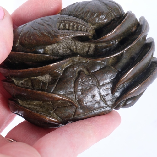 146 - A small cast-bronze crab