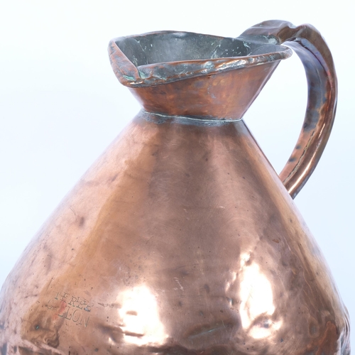 15 - A large 19th century gallon copper jug, H40cm, with GR cypher