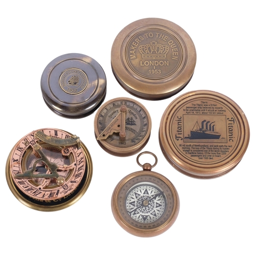 155 - A group of 6 reproduction brass compasses