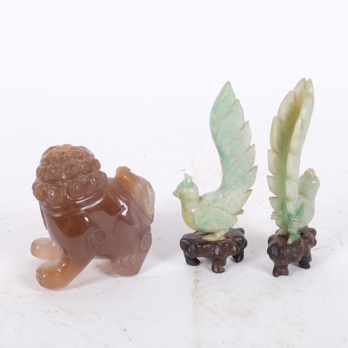 159 - A pair of Chinese carved jadeite birds on stands, and a quartz dog of fo (3)