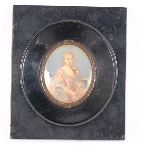 172 - A Victorian miniature watercolour on panel, portrait of a young lady holding a mask, indistinctly si... 