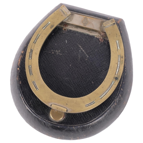 177 - ASPREY & SON - a leather-covered and brass-mounted horse shoe paper tidy