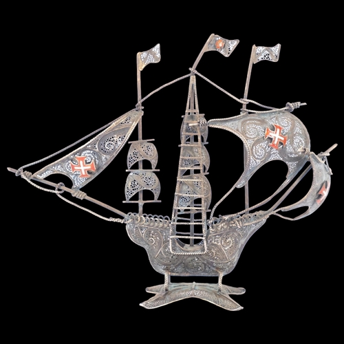 180 - A Maltese gilded white metal and enamel filigree 3-masted sailing ship, H13cm