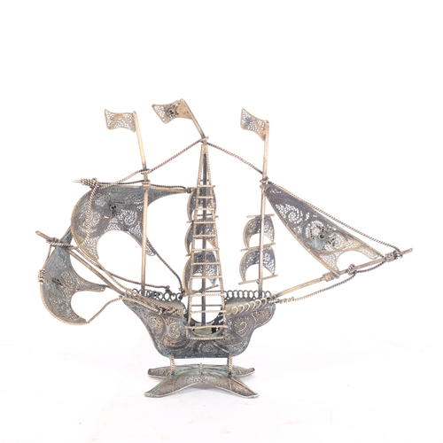 180 - A Maltese gilded white metal and enamel filigree 3-masted sailing ship, H13cm