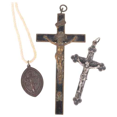 184 - An English silver hallmarked crucifix, L10cm, an ebony and brass-mounted crucifix, and another (3)