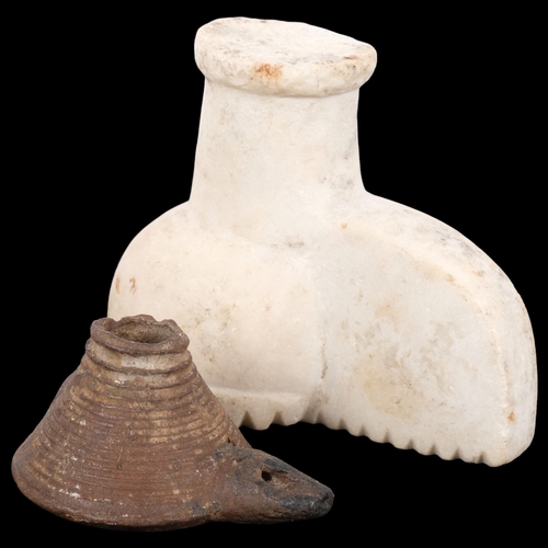 192 - A Middle Eastern stoneware oil lamp, and another, tallest 11.5cm (2)