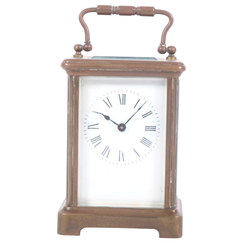 197 - A French brass-cased carriage clock, H11cm not including handle, complete with key, currently in wor... 