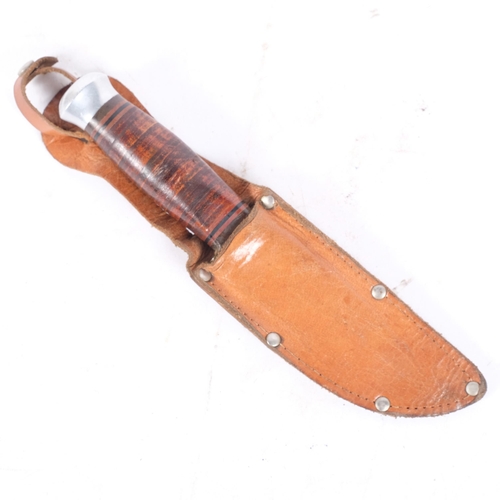 200 - A Scandinavian hunting knife and leather scabbard, blade length 11cm which is marked Schneidteufel, ... 