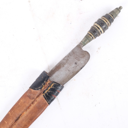 204 - A small Indian knife with barrel turned horn handle and leather scabbard, L23cm