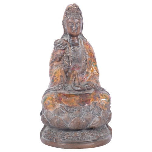 214 - A Chinese bronze Buddha sat upon a lotus leaf, with enamel decoration, H29cm