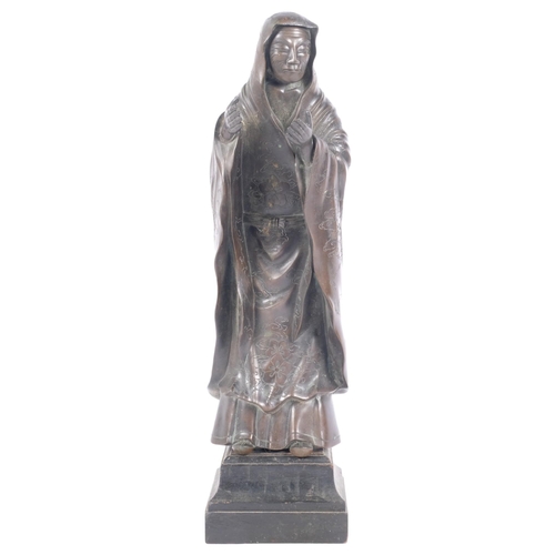 227 - An Antique Chinese bronze figure of a sage, with engraved prunus decoration, on stained wood stand, ... 