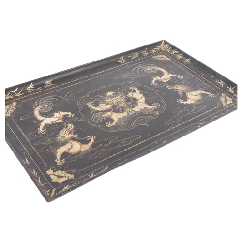 229 - A rectangular black lacquered serving tray, gilded dragon decoration, 53cm x 33cm