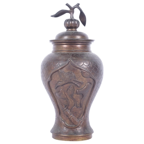 230 - A Chinese bronze baluster vase and cover, with engraved embossed and raised decoration, with seal ch... 