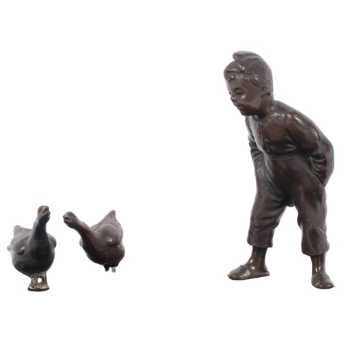 249 - A 20th century marble bowl surmounted by bronze boy and geese, diameter 21cm