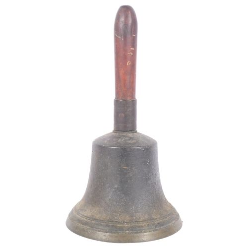 253 - An early 20th century bronze hand bell with clanger, H30cm