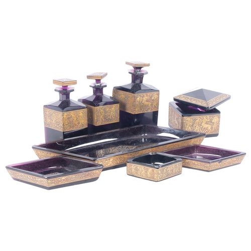 254 - A collection of early 20th century amethyst glass dressing table bottles and dishes, including 3 sce... 