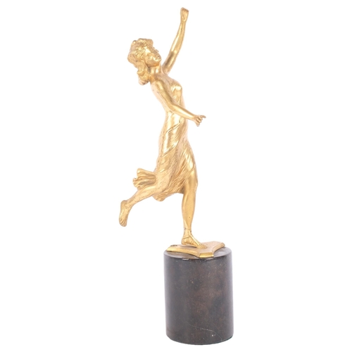 267 - An Art Deco gilt-metal dancing figure on turned marble base, overall height 38cm, signed to the base