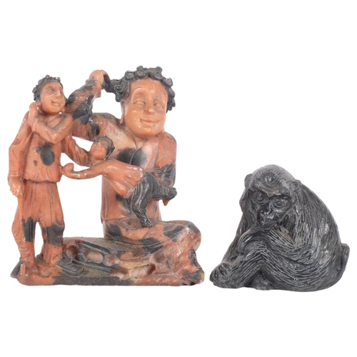 268 - A soapstone carving of 3 figures, H14cm, and carved stone baboon