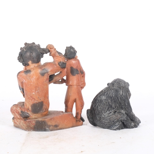 268 - A soapstone carving of 3 figures, H14cm, and carved stone baboon