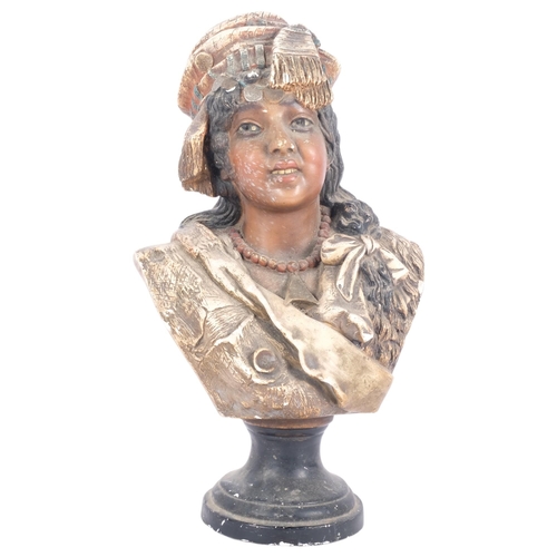 275 - A Victorian painted plaster bust, figure in a tasselled hat, H44cm