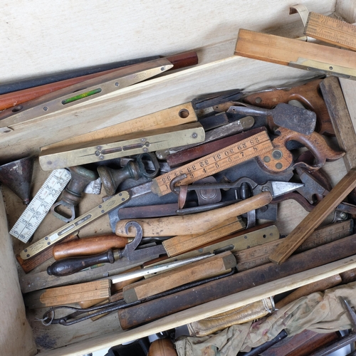 276 - A collection of Vintage woodworking tools, including planes, moulding plane, folding rules, etc, in ... 