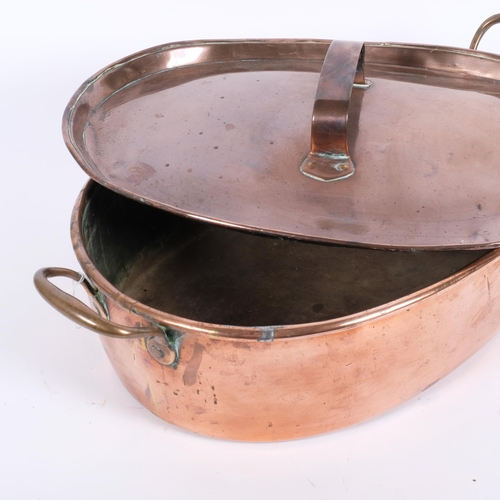 28 - A large 19th century oval copper 2-handled pan and cover, W58cm