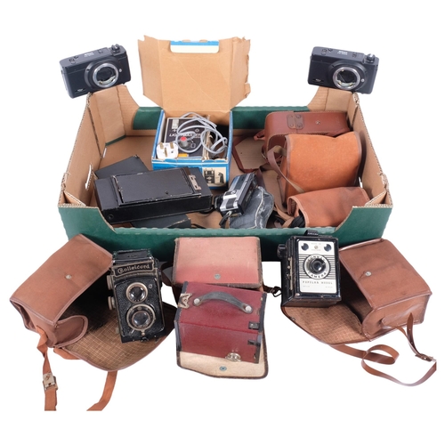 284 - A box of various Vintage cameras, including a Rolleicord, Kodak, various accessories, etc (boxful)