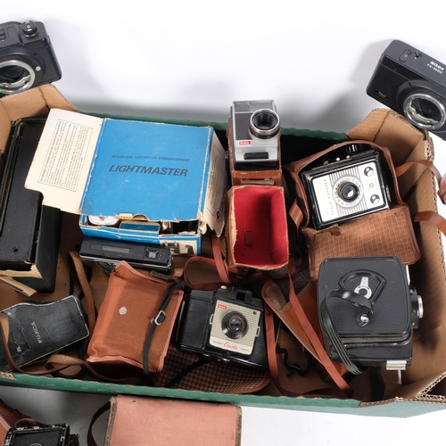 284 - A box of various Vintage cameras, including a Rolleicord, Kodak, various accessories, etc (boxful)