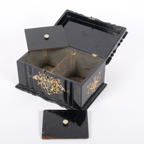 3 - A Victorian papier mache tea caddy, with 2 fitted inner lids, scrolled gilded and mother-of-pearl de... 