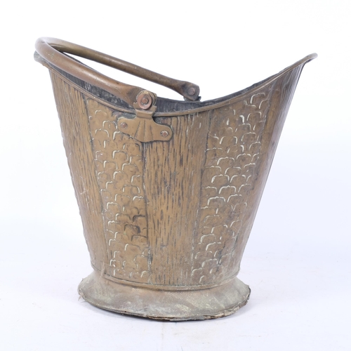 304 - An Antique Art Nouveau embossed fireside coal bucket, H32cm