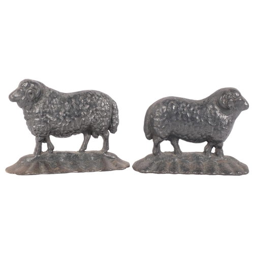 305 - A pair of cast-iron Antique door stops in the form of rams, unsigned, H17.5cm, L24cm (2)