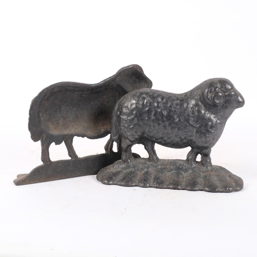 305 - A pair of cast-iron Antique door stops in the form of rams, unsigned, H17.5cm, L24cm (2)