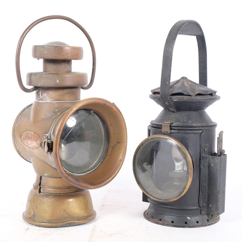 312 - 2 similar Antique hand-held railway lanterns, including a copper lantern made by 