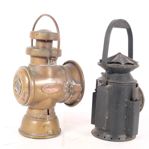 312 - 2 similar Antique hand-held railway lanterns, including a copper lantern made by 